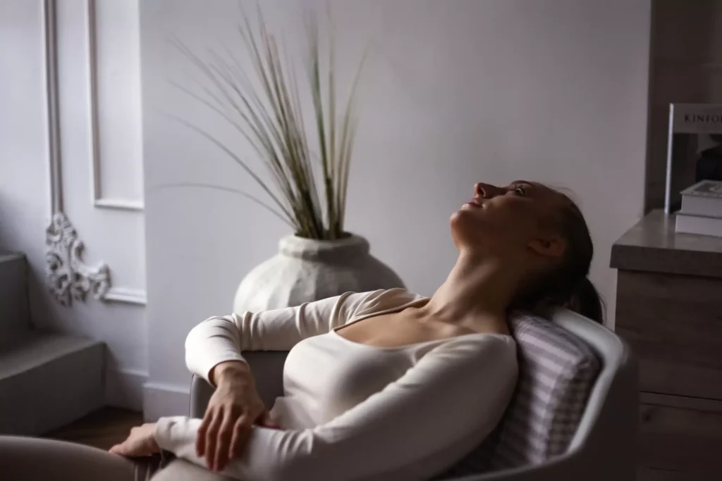 a woman sitting in a chair