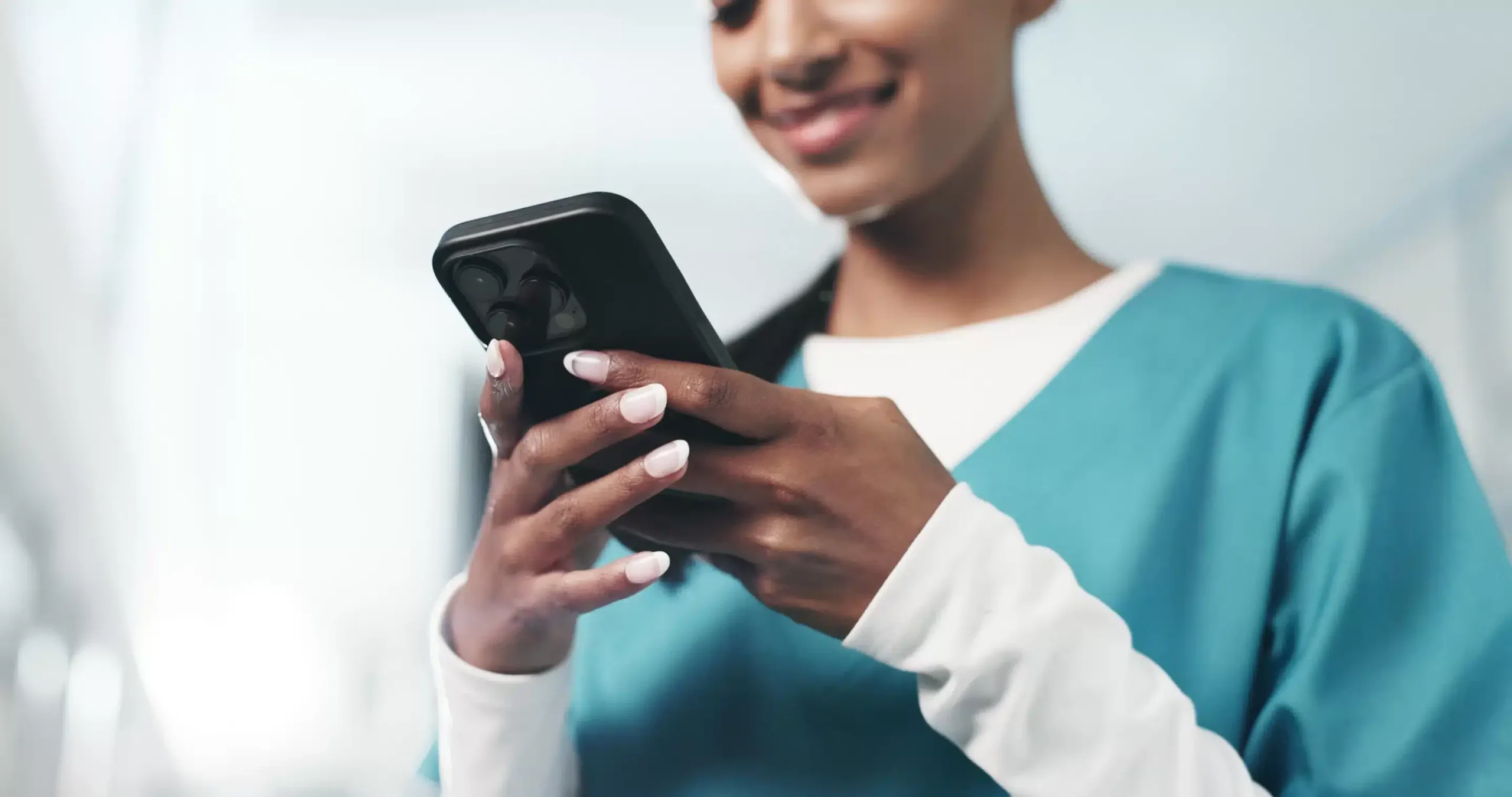 a woman holding a phone