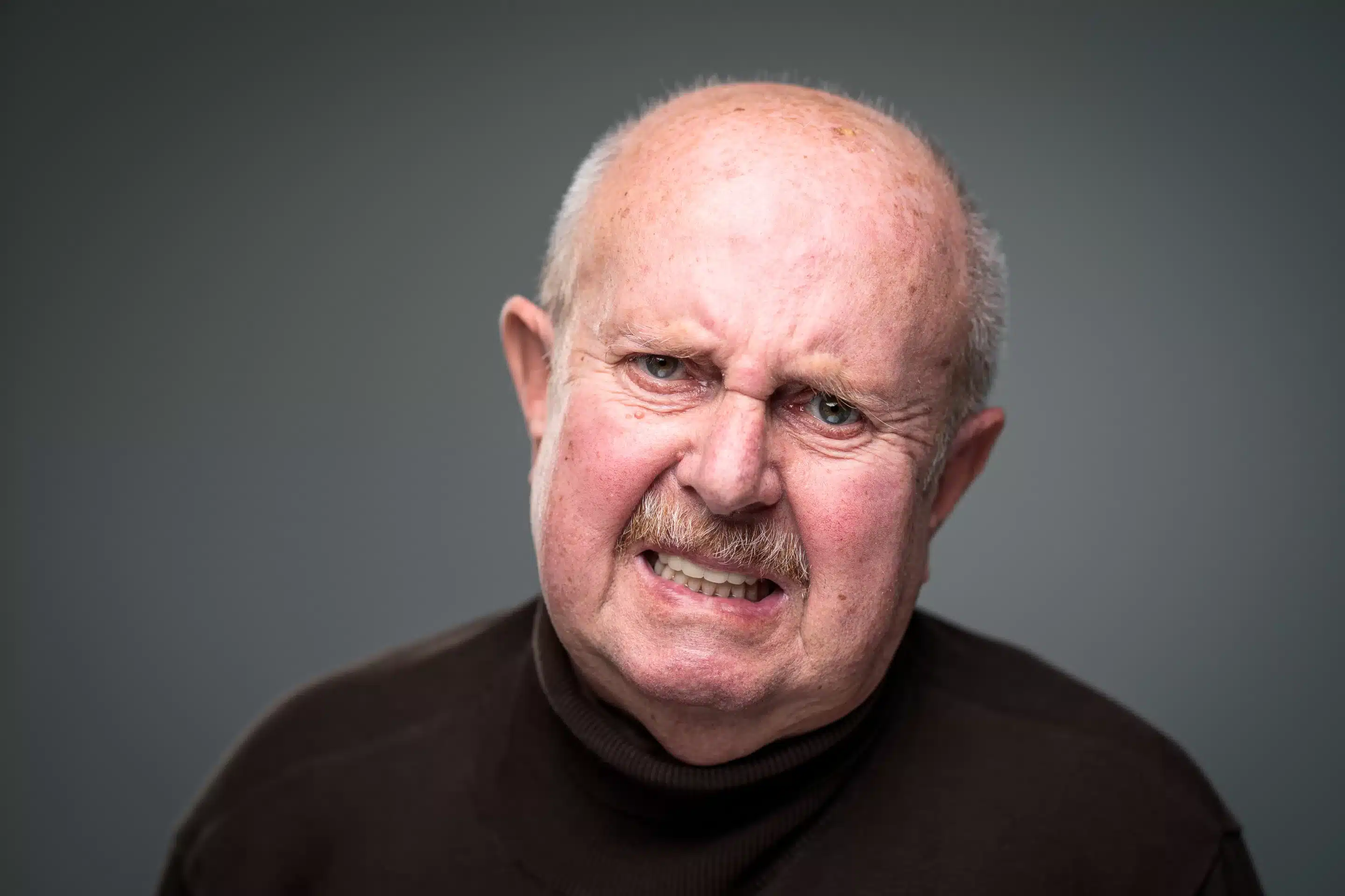 a man with a mustache and a mustache